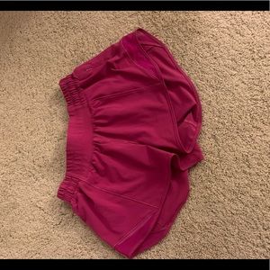 LULULEMON ripened raspberry bitty hot 2.5’ shorts (size 4)